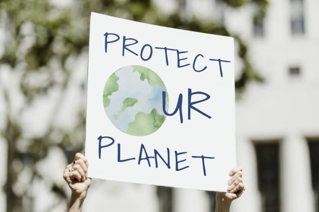 protect your planet environmentalist protesting ag 2022 12 16 00 41 51 utc